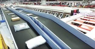 راهنمای انتخاب پارسل سورتر بر اساس سرعت ماشین و ابعاد بستهها