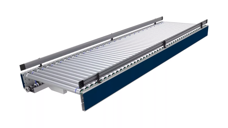 نوار نقاله شافت متحرک در نقاله غلطکی Line Shaft، یک شفت طولی مرکزی (معمولاً فولادی) که توسط یک موتور AC به گردش در میآید، نیروی چرخشی را از طریق تسمههای O-ring یا الاستومری به غلطکهای هر زون منتقل میکند. --- ویژگیها: انتقال قدرت غیرمستقیم: موتور شفت را میچرخاند و این شفت با تسمههای حلقوی، غلطکها را به حرکت درمیآورد. مناسب برای زونبندی: میتوان با قرار دادن کلاچ، چرخدنده یا ترمز، زونها را جداگانه کنترل کرد. نرم و بیصدا: حرکت نرم و نسبتا کمصدا نسبت به سیستمهای زنجیردار. ایمن برای اپراتور: به دلیل گشتاور پایین تسمهها و انعطافپذیری آنها.